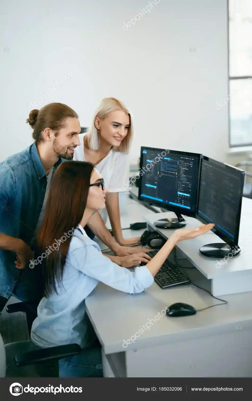 depositphotos 185032096 stock photo it team working in office 1